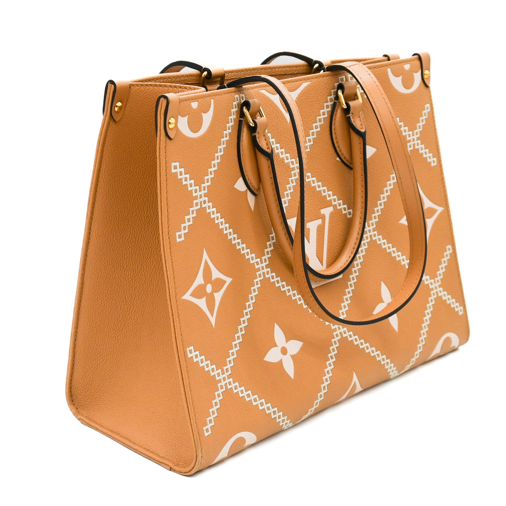 Louis Vuitton OnTheGo Monogram Empreinte Giant Broderies MM Tote Bag - ShopShops