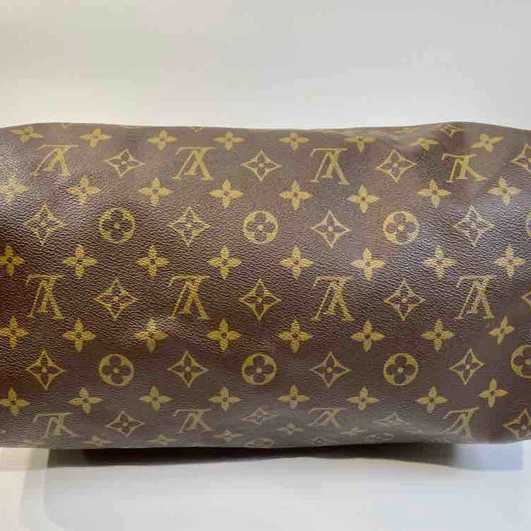 LOUIS VUITTON Monogram Speedy 35 Handbag, Brown, Coated Canvas - ShopShops