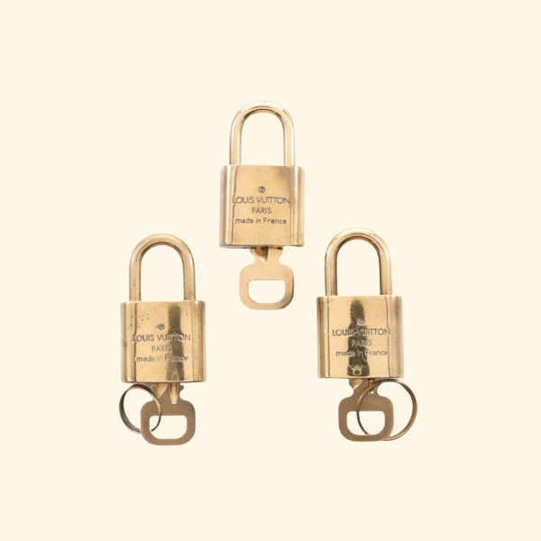 Louis Vuitton Gold Metal Lock&Key - ShopShops